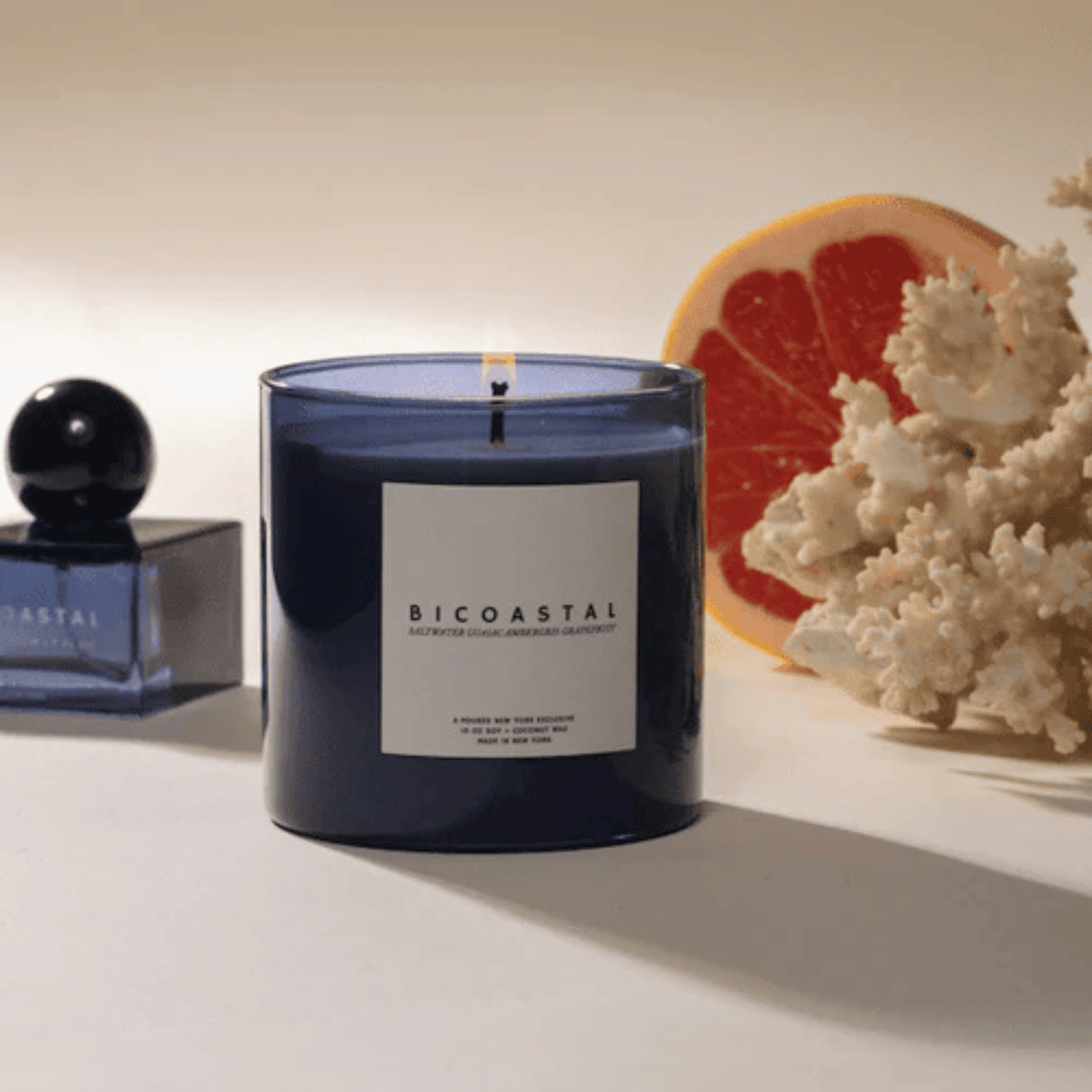 Alternate Image of Bicoastal Candle, blue glass candle with white label