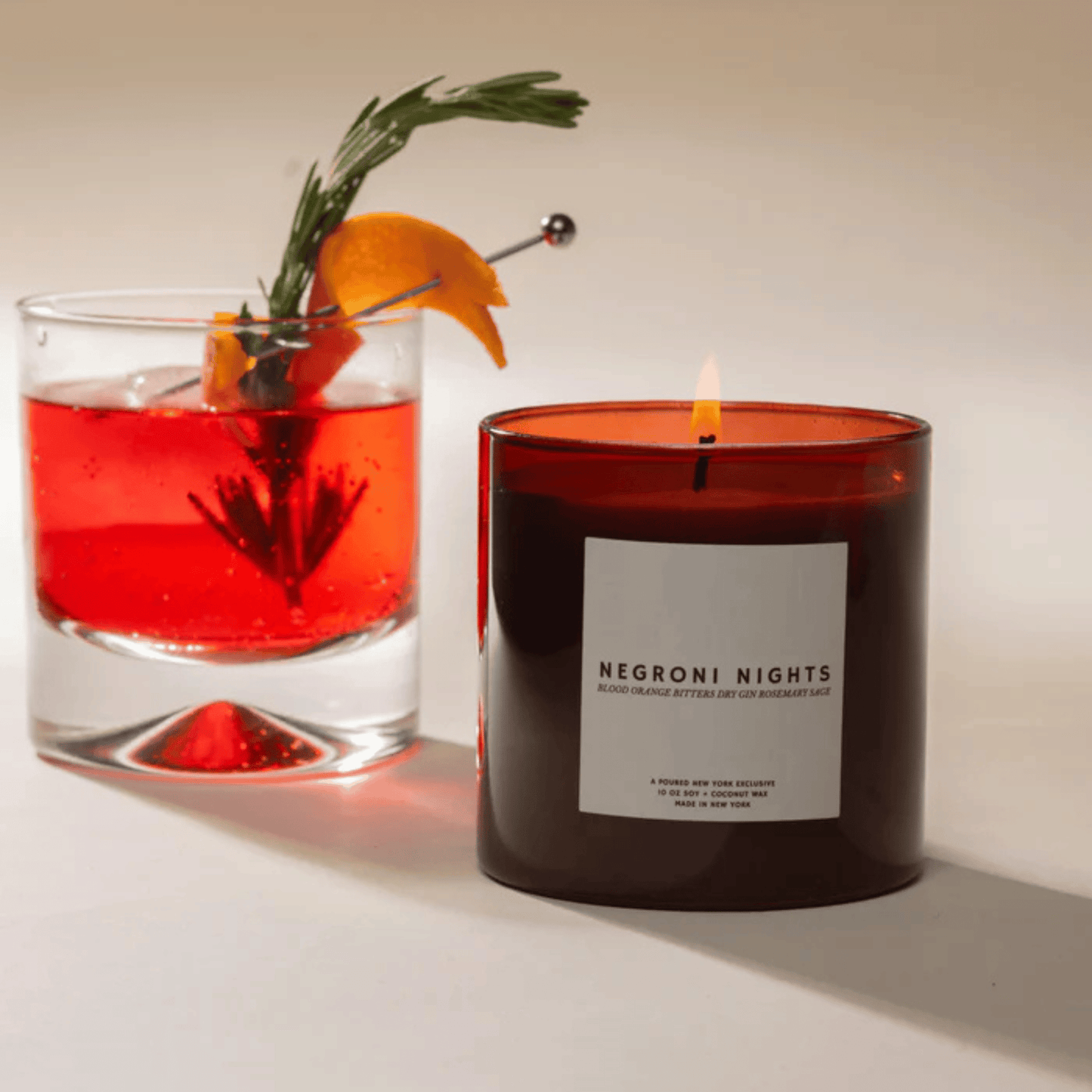 Alternate Image of Negroni Nights Candle, dark red glass candle vessel with white label