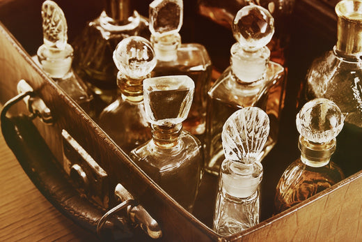 Perfume bottles arranged in an open display case