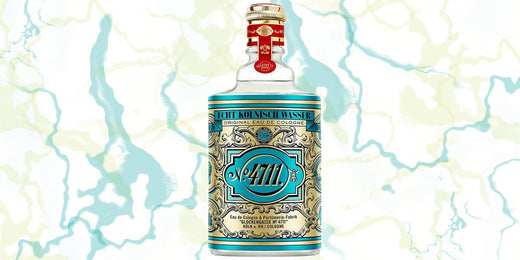 Front view of 4711 Original Eau de Cologne bottle with ornate turquoise and gold label on a marbled background