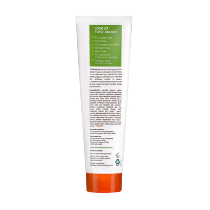 Rear view of Himalaya Bamboo + Sea Salt Toothpaste tube showcasing green claims panel and orange cap on white background