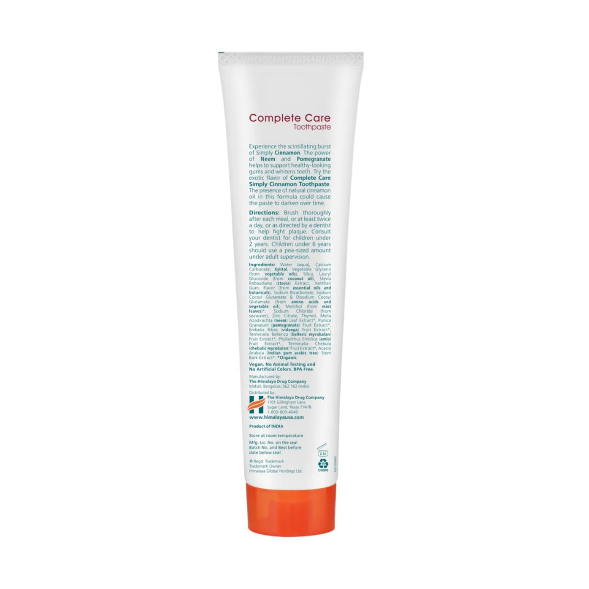 Back view of Himalaya Complete Care Simply Cinnamon Toothpaste tube showing product information on a white background