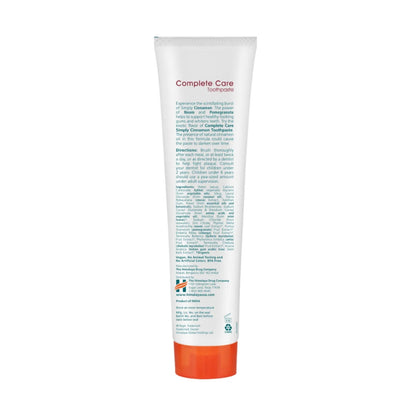Back view of Himalaya Complete Care Simply Cinnamon Toothpaste tube showing product information on a white background