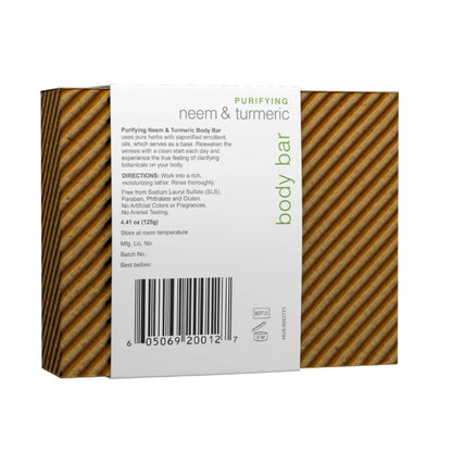 Front view of Purifying Neem and Turmeric Body Bar showcasing striped soap bars and labeled wrapper on a white background