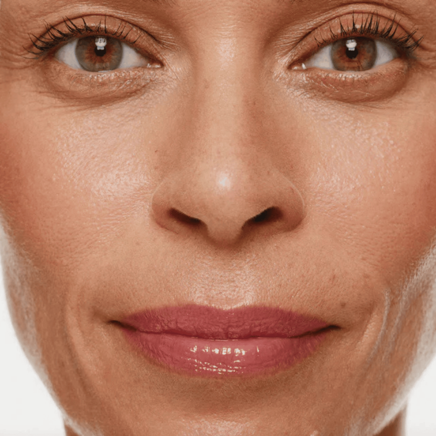 Alternate image of model wearing ILIA Enamel Overglaze Hydrating Lip Gloss