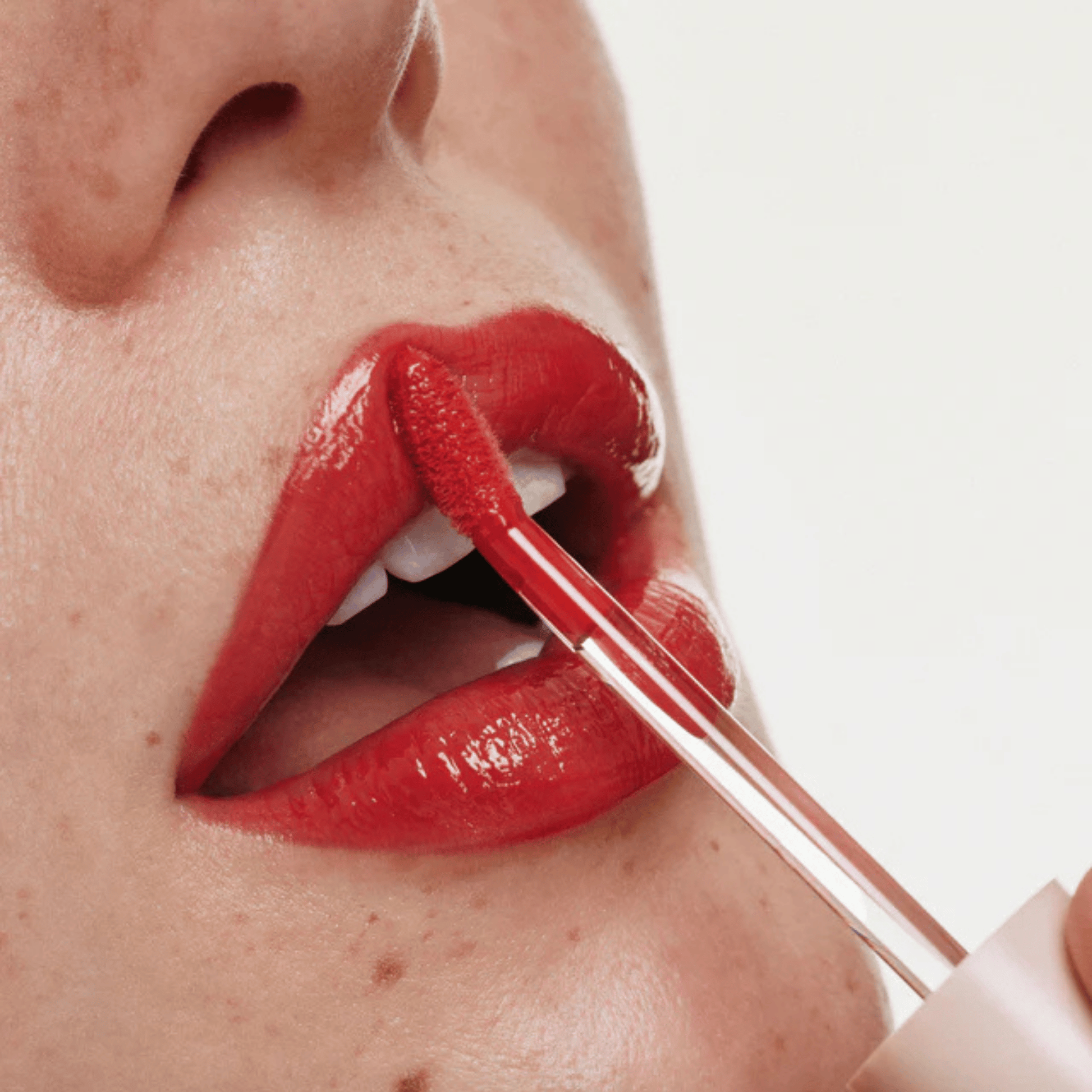 Alternate image of model wearing ILIA Flambe Overglaze Hydrating Lip Gloss