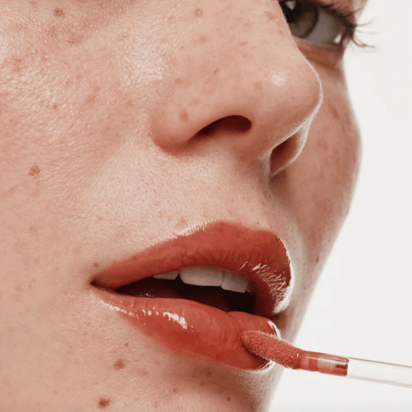 Alternate image of model wearing ILIA Terra Overglaze Hydrating Lip Gloss