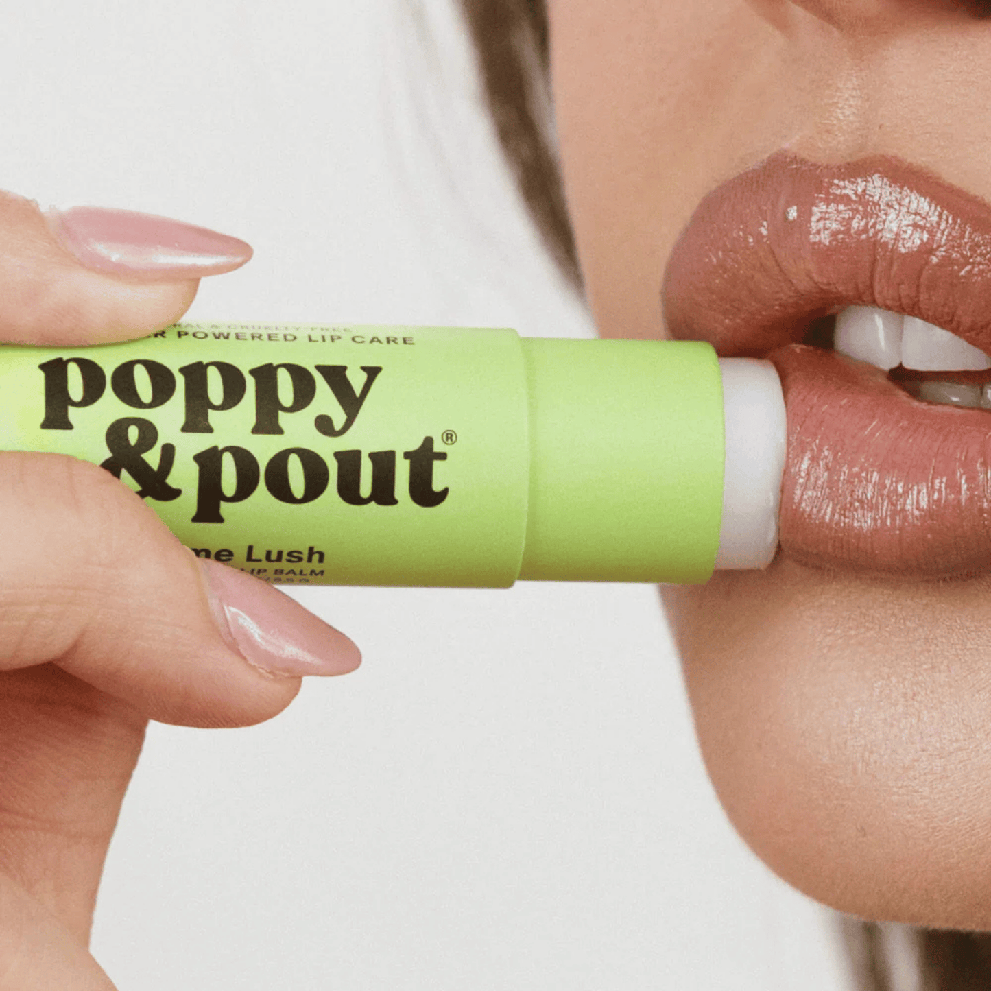 Alternate image of model using Poppy & Pout Lime Lush Lip Balm