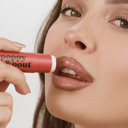 Alternate image of model using Poppy & Pout Raspberry Creme Lip Balm