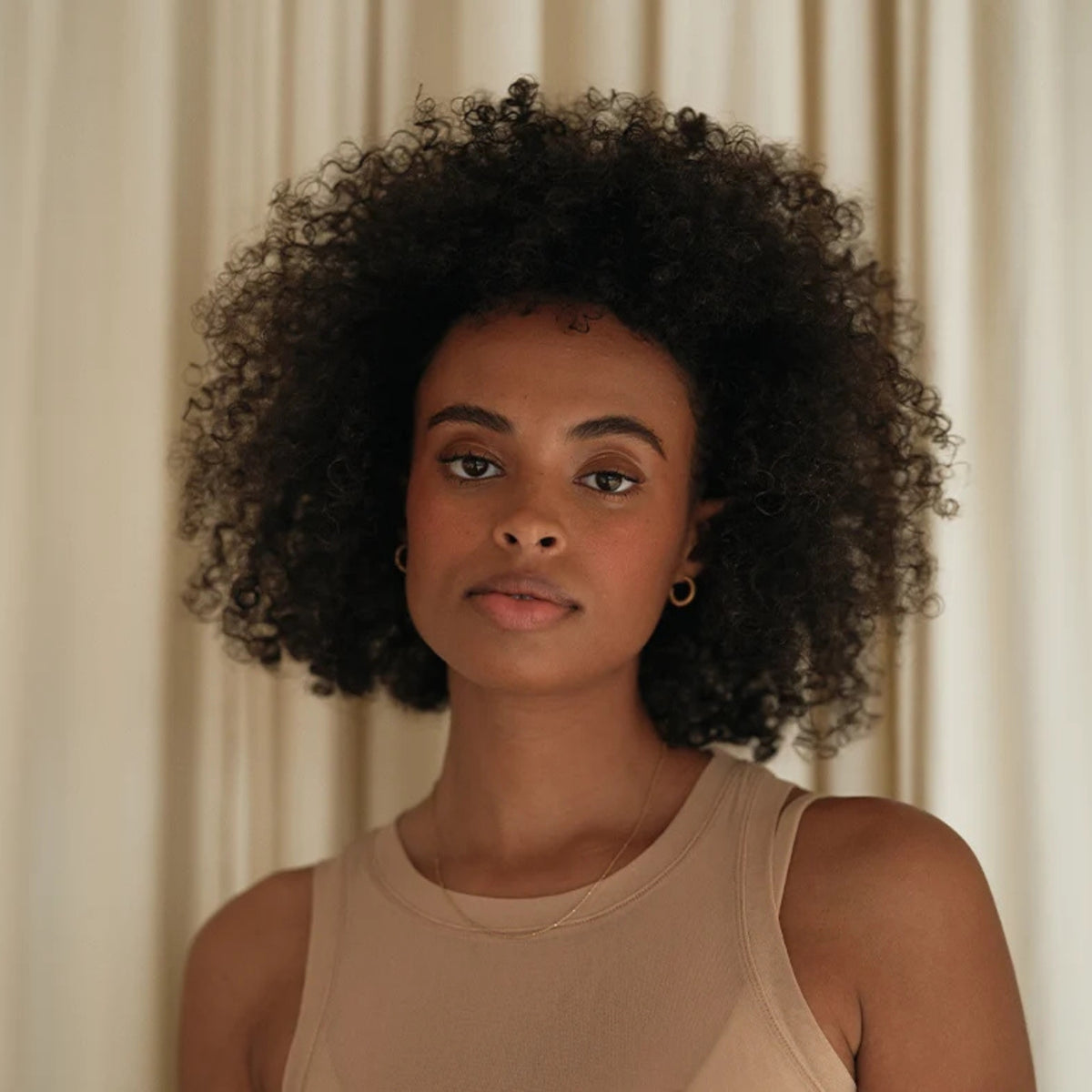 Alternate image of REVERIE Hymn Hair Gel model styling it 