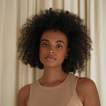 Alternate image of REVERIE Hymn Hair Gel model styling it 