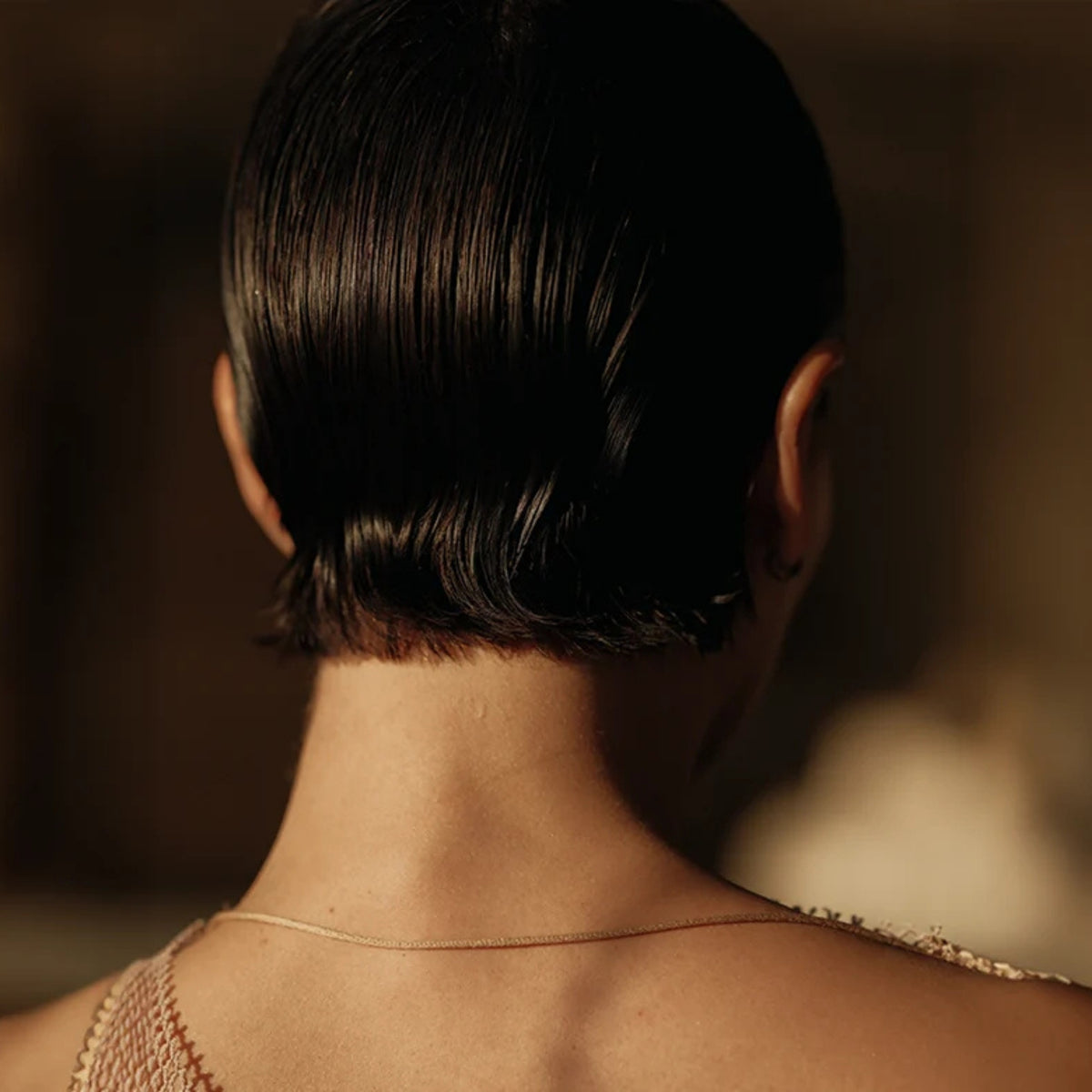 Alternate image of REVERIE Hymn Hair Gel model styling it 
