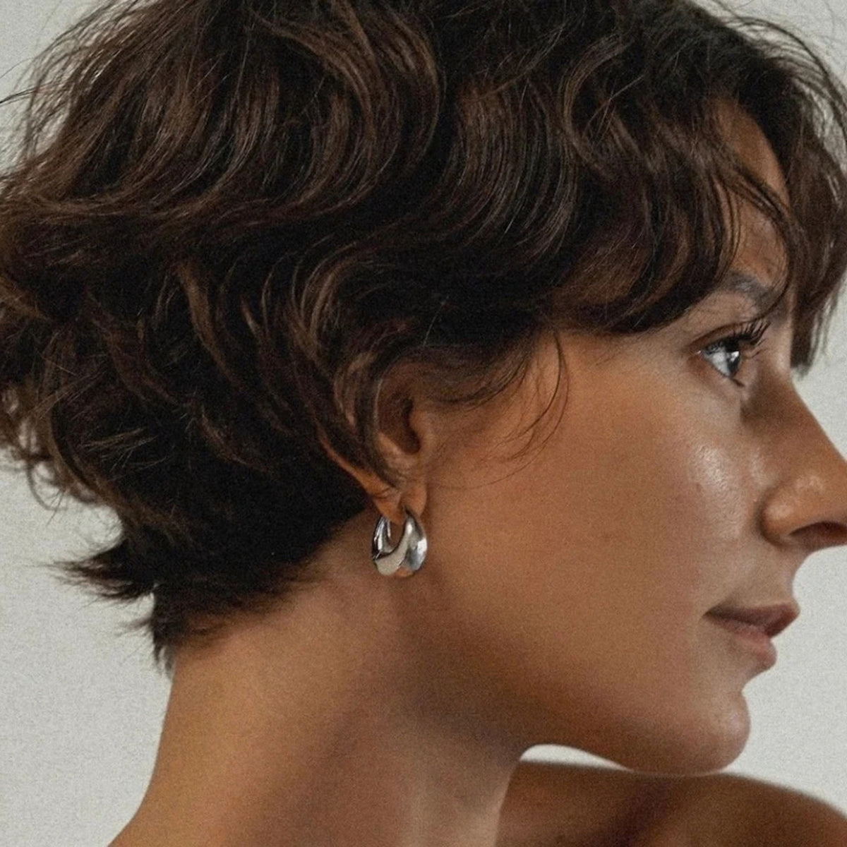 Alternate image of REVERIE Rake Styling Balm model styling it