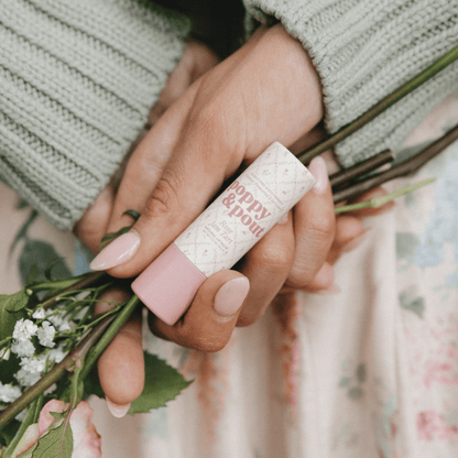 Hand image of Poppy & Pout Rose Jam Tart Cottage Collection Lip Balm
