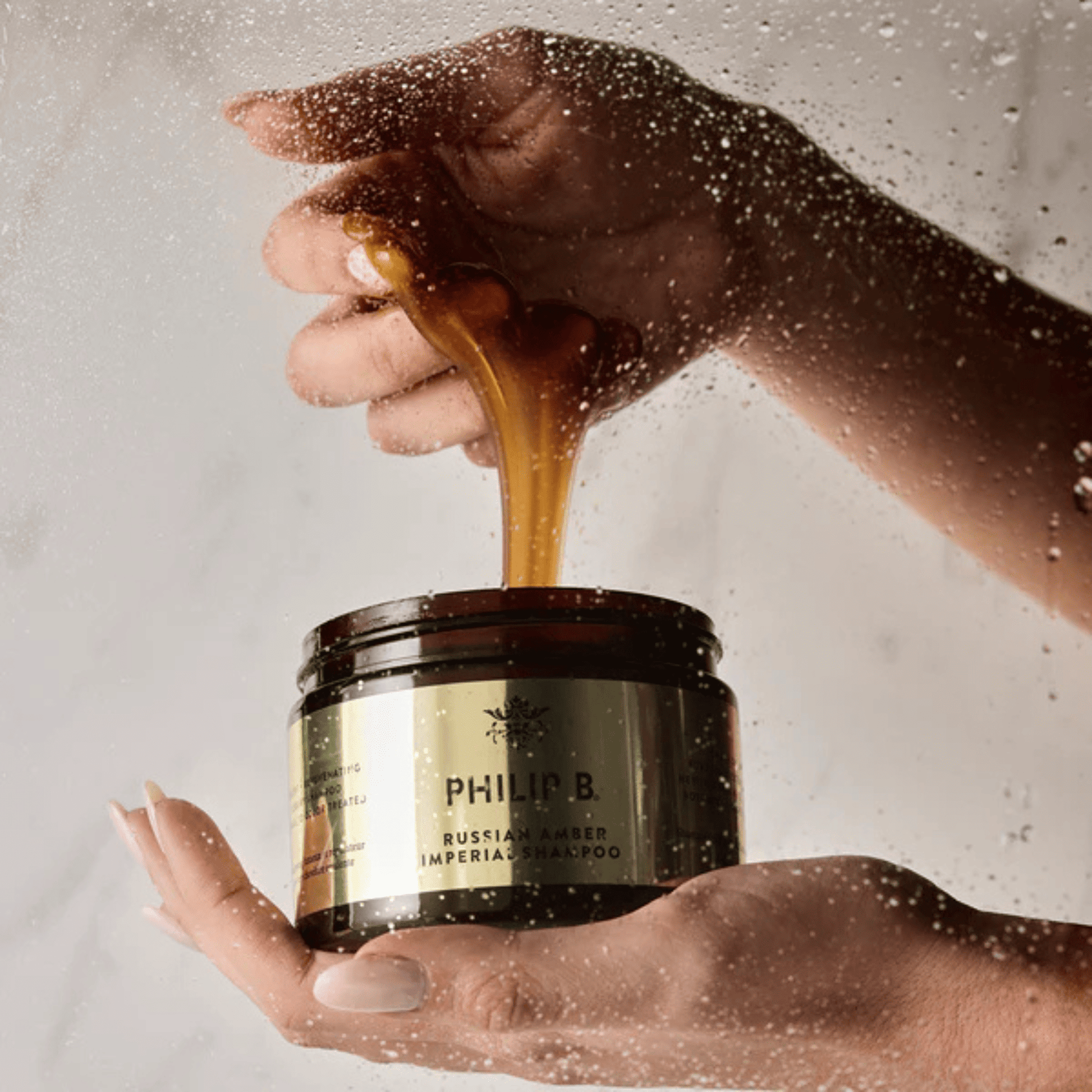 Hand image of Philip B. Russian Amber Imperial Shampoo 
