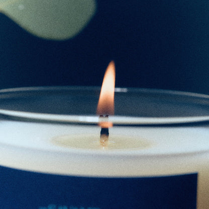 Alternate Image of Moonrise in a Forest Candle, candle with dark label in a moody forest setting
