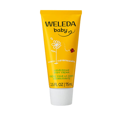 Front view of Weleda Baby Nourishing Calendula Body Cream showcasing yellow tube packaging with white cap on white background