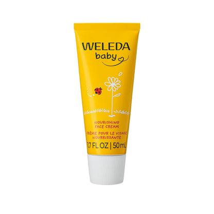 Front view of Weleda Baby Nourishing Face Cream tube with yellow packaging on a white background