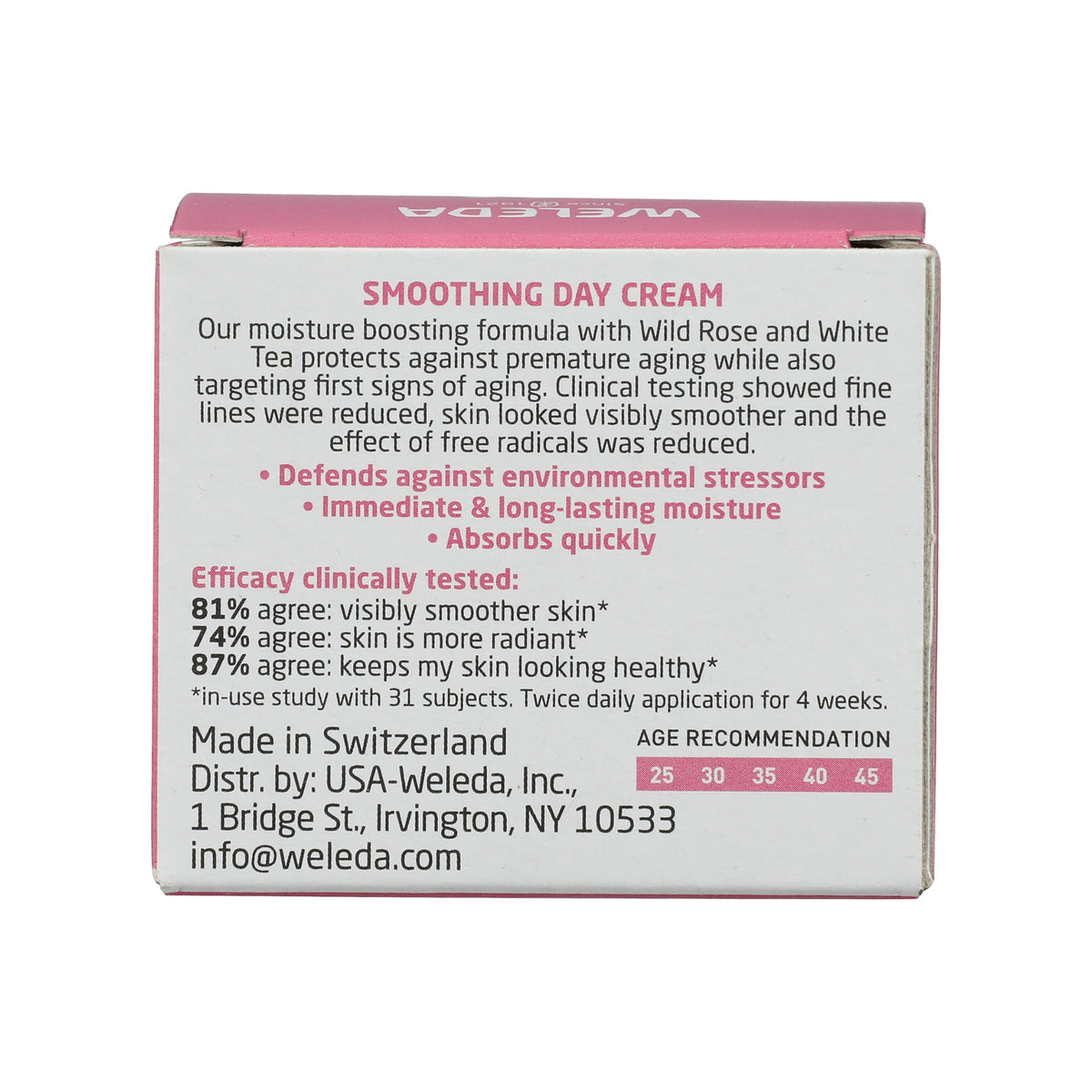 Back view of Weleda Smoothing Day Cream box showcasing wild rose, white tea, and moisture claims on a white background