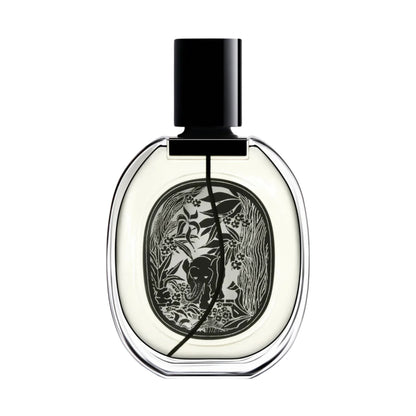 Front view of Tam Dao Eau de Parfum showcasing its ornate label and black cap against a white background
