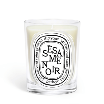 Primary Image of Sesame Noir Candle, clear glass vessel with black and white oval label