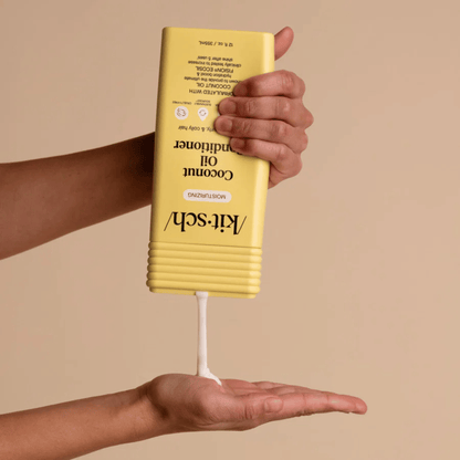 Alternate Image of Moisturizing Coconut Oil Conditioner, yellow conditioner bottle