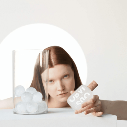 Atlernate Image of White Crush Kakigori EDP, frosted perfume bottle with cork cap and model