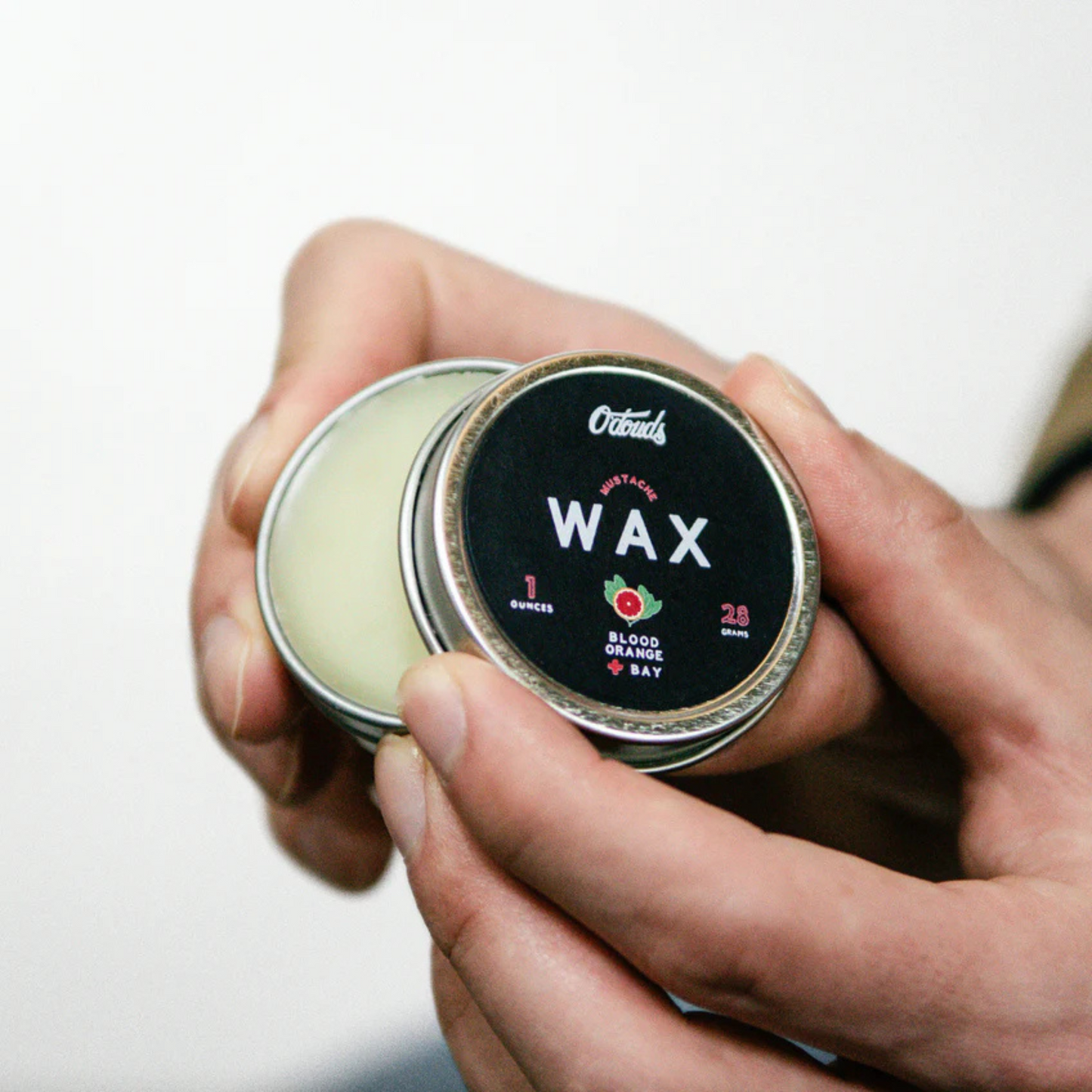 alternate image of odouds mustache wax blood orange and bay