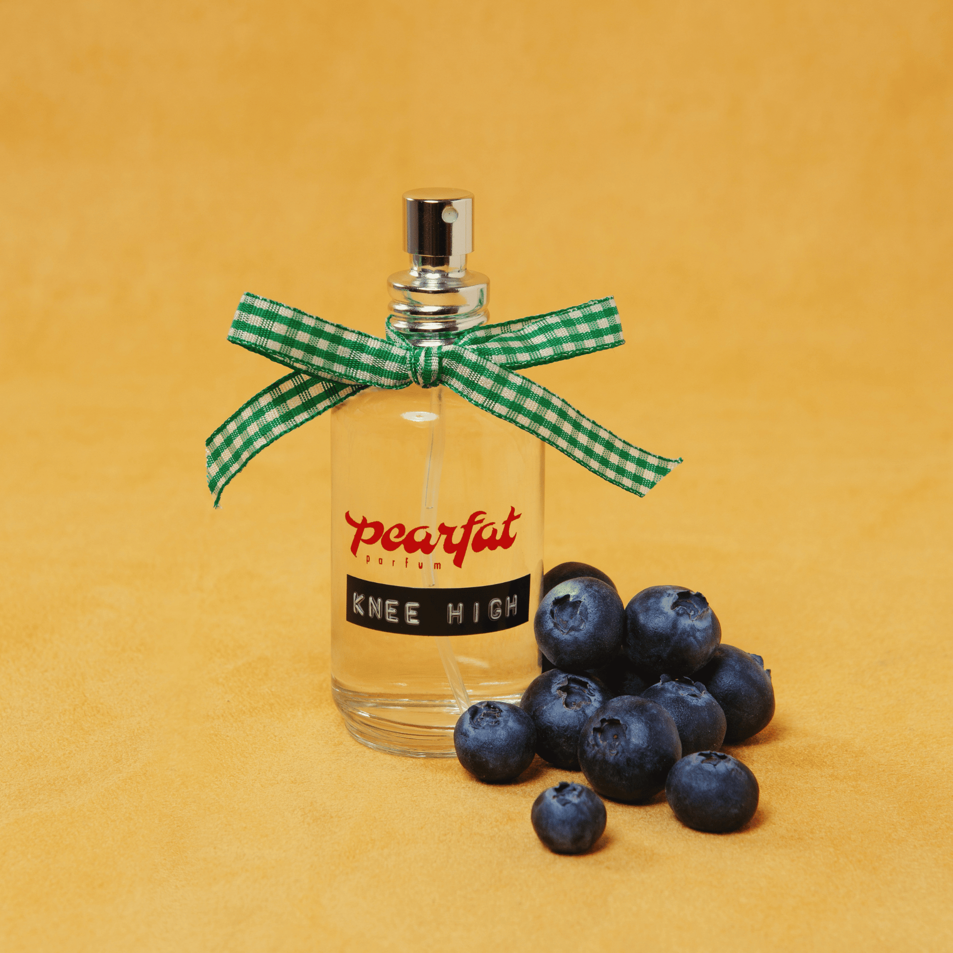 Primary Image of Limited Edition Knee High EDP, perfume bottle with bow