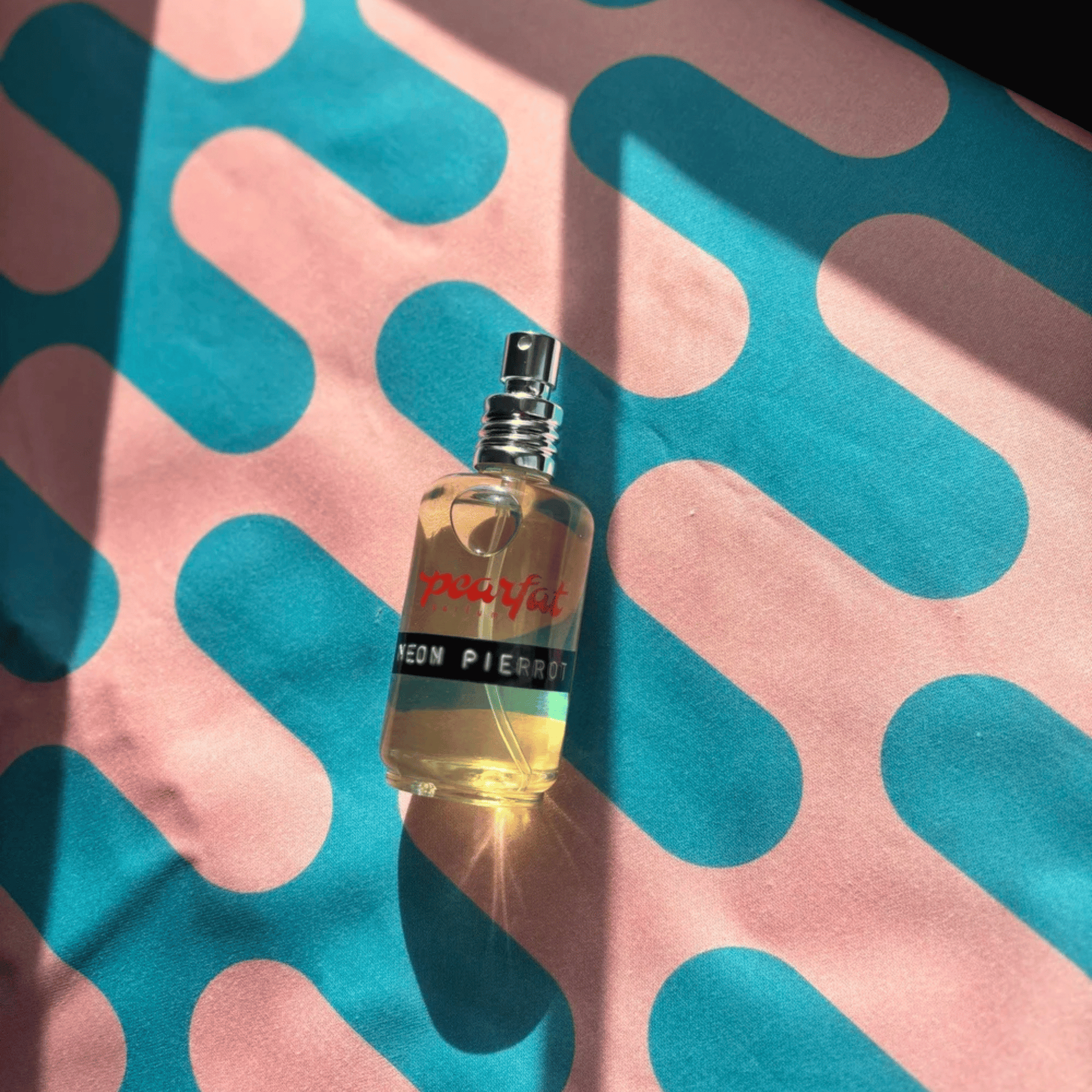 Atlernate Image of Limited Edition Neon Pierrot EDP, perfume bottle wth label