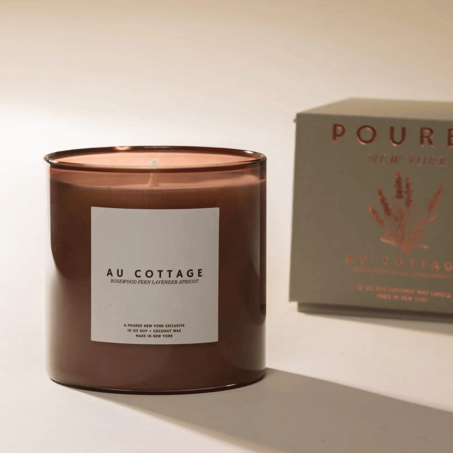 Alternate Image of Au Cottage Candle, soft brown glass candle with white label