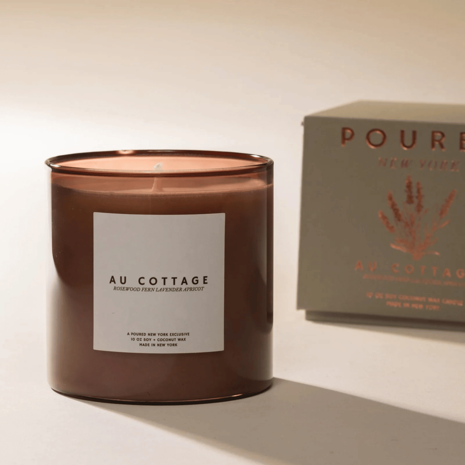 Alternate Image of Au Cottage Candle, soft brown glass candle with white label