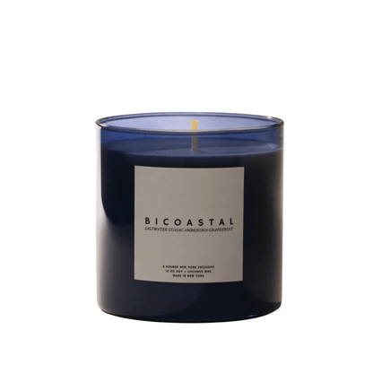 Primary Image of Bicoastal Candle, blue glass candle with white label