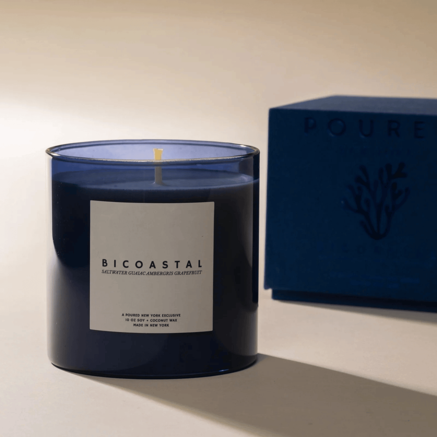 Alternate Image of Bicoastal Candle, blue glass candle with white label and box