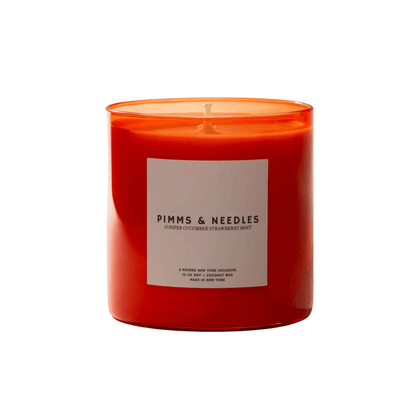 Primary Image of Pimms & Needles Candle, red candle vessel with white label