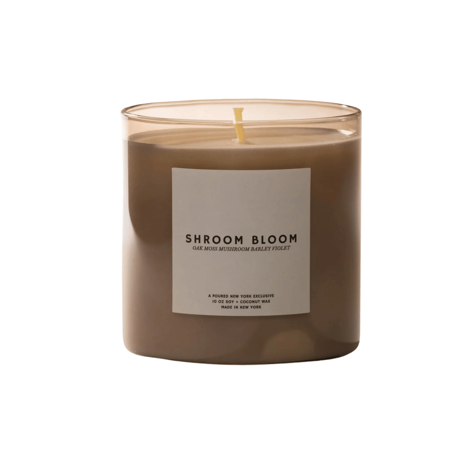 Primary Image of Shroom Bloom Candle, light brown candle vessel with white label