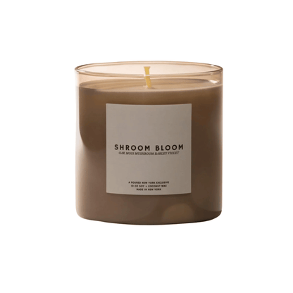 Primary Image of Shroom Bloom Candle, light brown candle vessel with white label