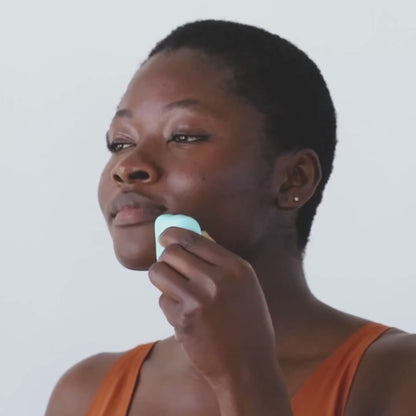 Alternate video of the Melt Stick SPF 50, blue spf twist up stick with model