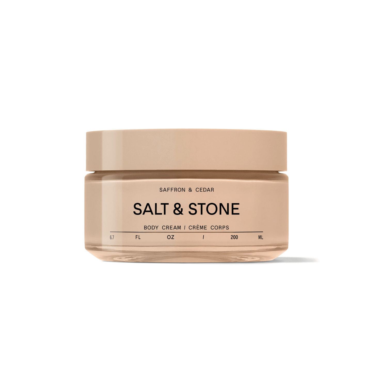 Primary Image of Saffron and Cedar Body Cream, round glass jar of body cream