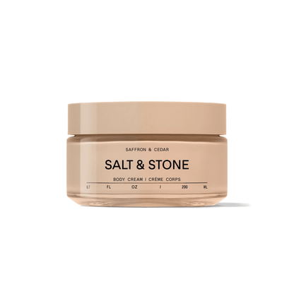 Primary Image of Saffron and Cedar Body Cream, round glass jar of body cream