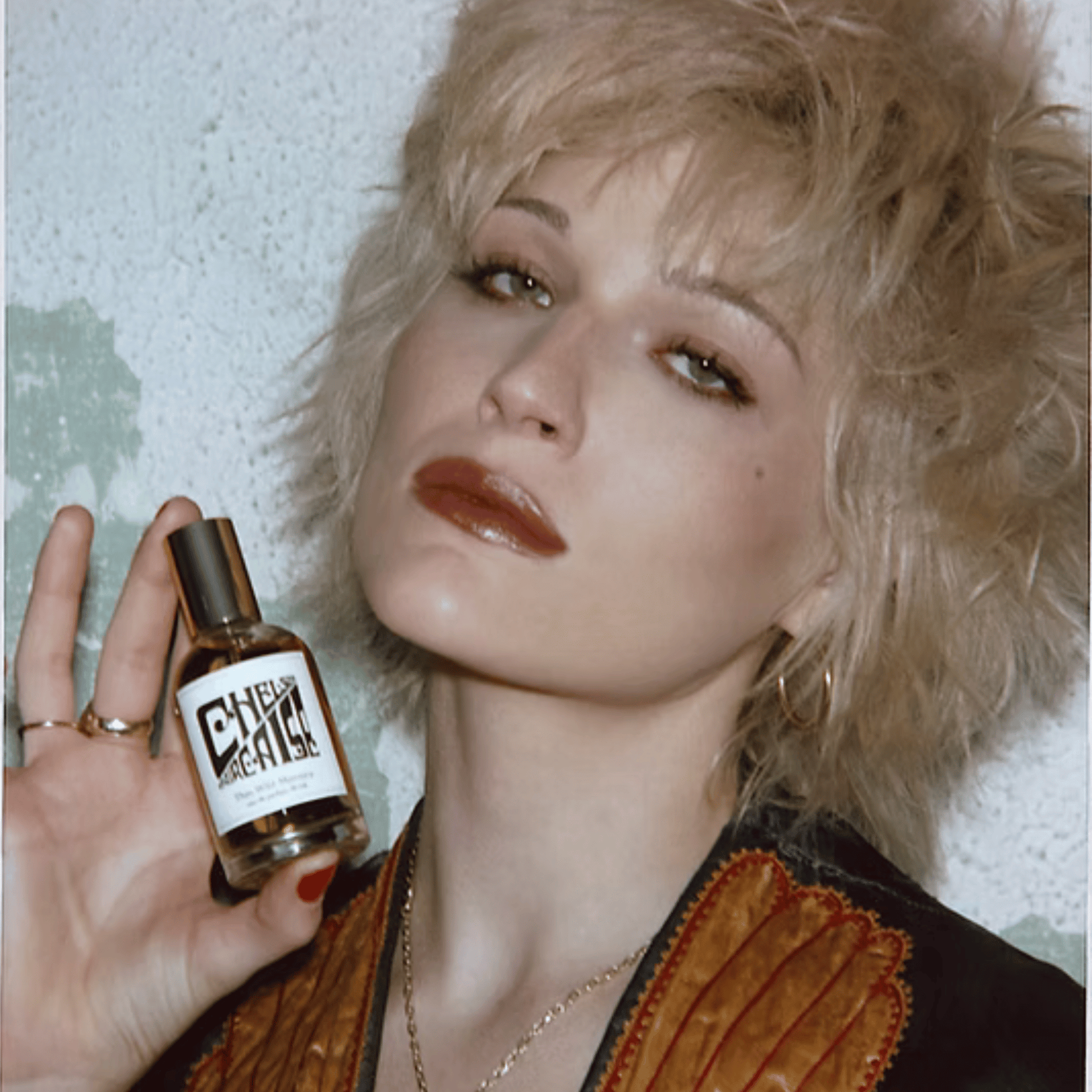 Atlernate Image of Chelsea Staircase EDP, perfume bottle with model