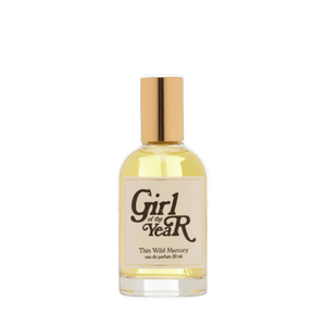 Front view of Thin Wild Mercury Girl of the Year Eau de Parfum bottle with gold cap on a white background