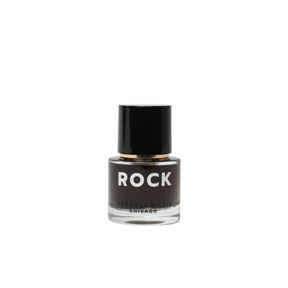 Primary Image of ROCK Perfume Extrait, round perfume bottle with dark lid