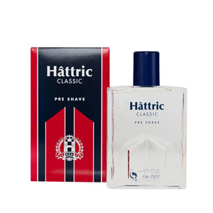 Front view of Hattric Classic Pre-Shave bottle and box showcasing red and white packaging on a white background