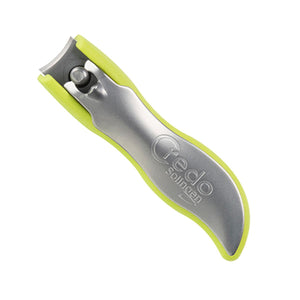 Angled view of Credo Green Pop Art Nail Clipper showcasing green trim and metal jaws on white background