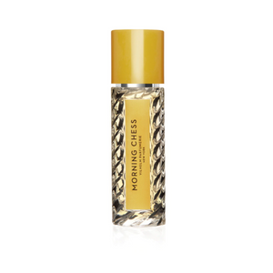 Front view of Morning Chess Eau de Parfum bottle showcasing faceted glass and a gold cap on a white background