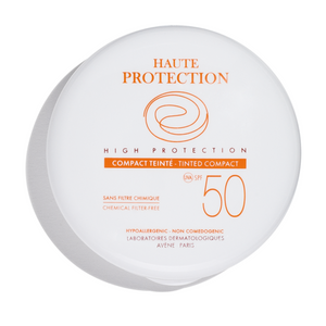 Top view of Mineral High Protection Tinted Compact SPF 50 compact showcasing chemical filter free text on white background