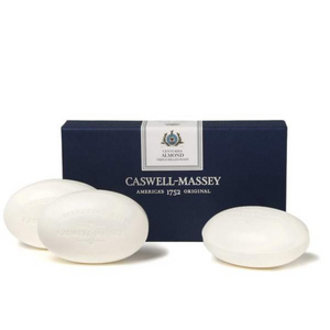 Front view of Caswell-Massey Almond 3 Bar Soap Set showcasing three oval white soaps and a navy box