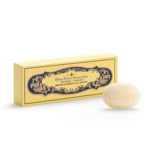 Three-quarter view of Santa Maria Novella Floral Cologne Soap showcasing ornate floral packaging with box and bar on white background